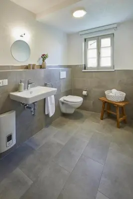 Ein Badezimmer in der Unterkunft Winzerlodge, Wohnung Riesling