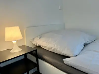 Ein Bett oder Betten in einem Zimmer der Unterkunft Monteurwohnung und Ferienwohnung Philippsburg