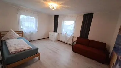 Ein Bett oder Betten in einem Zimmer der Unterkunft Ferienwohnung I&K