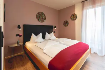 Ein Bett oder Betten in einem Zimmer der Unterkunft Hotel Restaurant Martha