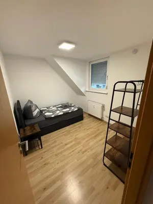 Ein Bett oder Betten in einem Zimmer der Unterkunft KRAICHGAU # 3-ZKB mit 100qm voll ausgestattet im DG, Monteurzimmer, Self-Check-in