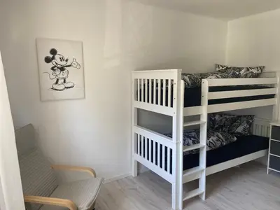 Ein Bett oder Betten in einem Zimmer der Unterkunft Ferienwohnung Nele