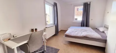 Ein Bett oder Betten in einem Zimmer der Unterkunft Apartment Neckarglück