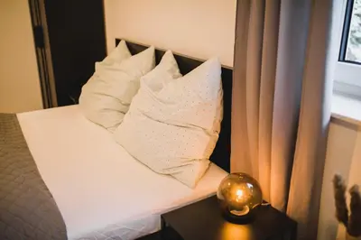 Ein Bett oder Betten in einem Zimmer der Unterkunft HUGOS Studio Apartment