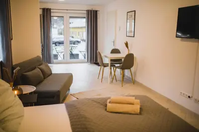 Ein Sitzbereich in der Unterkunft HUGOS Studio Apartment