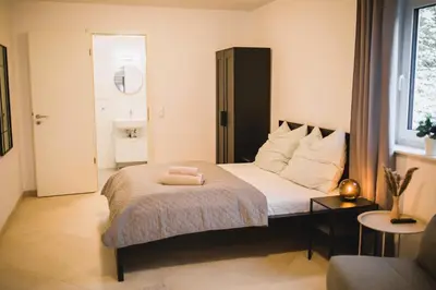 Ein Bett oder Betten in einem Zimmer der Unterkunft HUGOS Studio Apartment