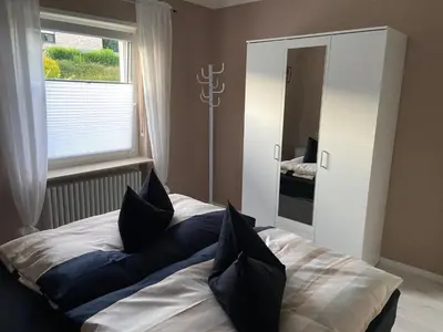 Ein Bett oder Betten in einem Zimmer der Unterkunft Ferienhaus Mayer Dahn Wohnung Neven