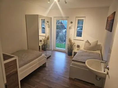 Ein Bett oder Betten in einem Zimmer der Unterkunft Ferienwohnung Königsberg
