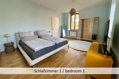 Ein Bett oder Betten in einem Zimmer der Unterkunft Neue90 - Fewo Saumagen, Weinstraße Kallstadt Pfalz