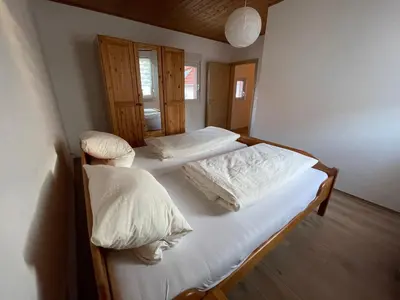 Ein Bett oder Betten in einem Zimmer der Unterkunft Ferienwohnung in Worms-Wiesoppenheim