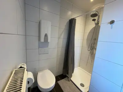 Ein Badezimmer in der Unterkunft Ferienwohnung in Worms-Wiesoppenheim