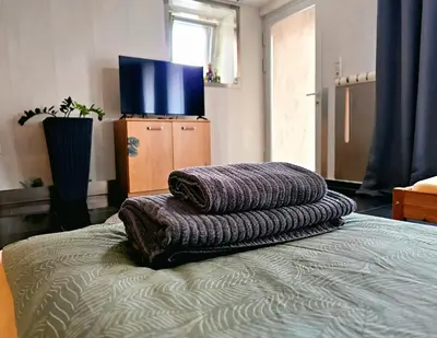 Ein Bett oder Betten in einem Zimmer der Unterkunft Gästeappartement Viktoria