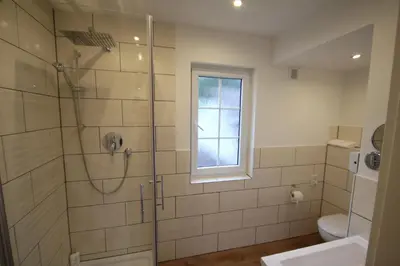 Ein Badezimmer in der Unterkunft Ringhotel Siegfriedbrunnen