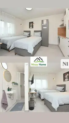 Ein Bett oder Betten in einem Zimmer der Unterkunft Nisay Home - 4 Room Apartment - N1