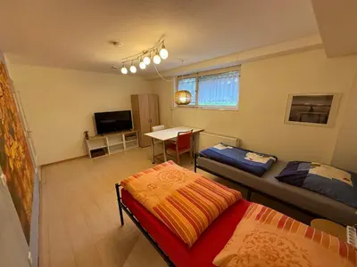 Ein Bett oder Betten in einem Zimmer der Unterkunft Nice and cosy studio apartment in a central location