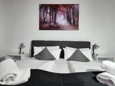 Ein Bett oder Betten in einem Zimmer der Unterkunft Rastatt Hotel Schiff