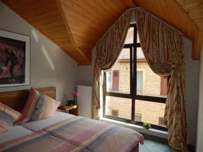 Ein Bett oder Betten in einem Zimmer der Unterkunft Apartment im Weingut