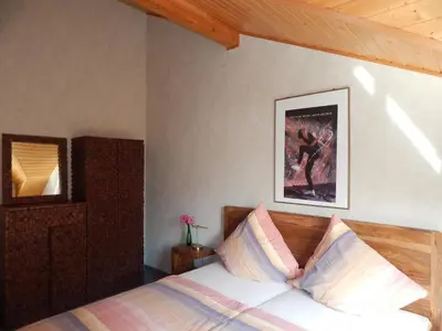 Ein Bett oder Betten in einem Zimmer der Unterkunft Apartment im Weingut