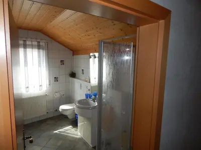 Ein Badezimmer in der Unterkunft Apartment im Weingut