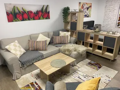 Ein Sitzbereich in der Unterkunft Gemütliches Apartment ebenerdig