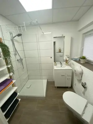 Ein Badezimmer in der Unterkunft Gemütliches Apartment ebenerdig