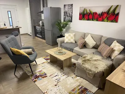 Ein Sitzbereich in der Unterkunft Gemütliches Apartment ebenerdig
