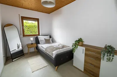 Ein Bett oder Betten in einem Zimmer der Unterkunft Cozy Holiday Home