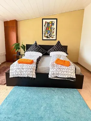 Ein Bett oder Betten in einem Zimmer der Unterkunft Lunetha Homes