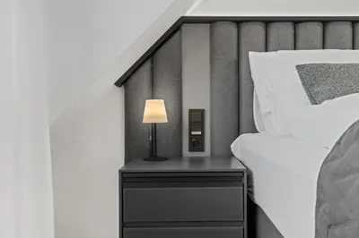 Ein Bett oder Betten in einem Zimmer der Unterkunft 1-2 Personen - Parkplatz - Fahrradgarage - Zentrum - Küche - WLAN - Klima