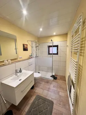 Ein Badezimmer in der Unterkunft Ferienwohnung Gaby - im Weingut Doll