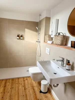 Ein Badezimmer in der Unterkunft Zita Ferienhäuser - Ferienhaus Burgi