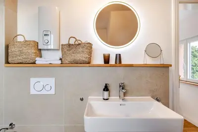 Ein Badezimmer in der Unterkunft Zita Ferienhäuser - Ferienhaus Burgi