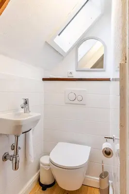 Ein Badezimmer in der Unterkunft Zita Ferienhäuser - Ferienhaus Burgi