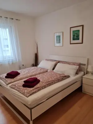 Ein Bett oder Betten in einem Zimmer der Unterkunft Wohnung mit Wintergarten