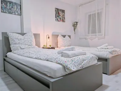 Ein Bett oder Betten in einem Zimmer der Unterkunft Charmantes schickes Apartment
