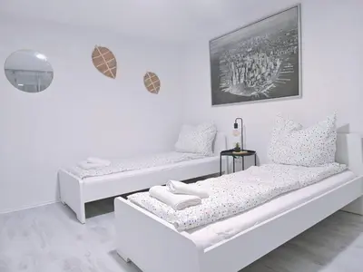 Ein Bett oder Betten in einem Zimmer der Unterkunft Charmantes schickes Apartment