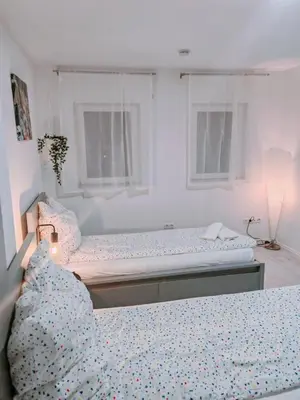 Ein Bett oder Betten in einem Zimmer der Unterkunft Charmantes schickes Apartment