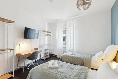 Ein Bett oder Betten in einem Zimmer der Unterkunft Zentral gelegenes 2BR Cityapartment in Neustadt an der Weinstraße