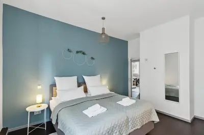 Ein Bett oder Betten in einem Zimmer der Unterkunft Zentral gelegenes 2BR Cityapartment in Neustadt an der Weinstraße
