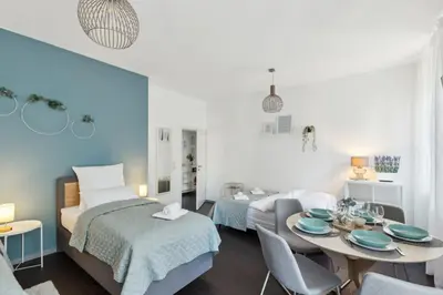 Ein Bett oder Betten in einem Zimmer der Unterkunft Zentral gelegenes 2BR Cityapartment in Neustadt an der Weinstraße