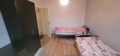 Ein Bett oder Betten in einem Zimmer der Unterkunft Ferienwohnungen Am Sportplatz im Gorxheimertal