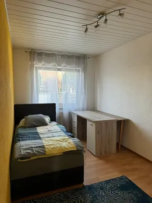 Ein Bett oder Betten in einem Zimmer der Unterkunft WAT Wohnung GR