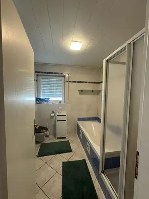 Ein Badezimmer in der Unterkunft WAT Wohnung GR