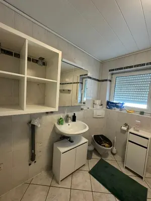 Ein Badezimmer in der Unterkunft WAT Wohnung GR
