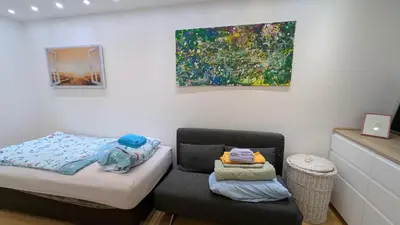 Ein Bett oder Betten in einem Zimmer der Unterkunft FeWo-Seeheim Barrierefrei EG
