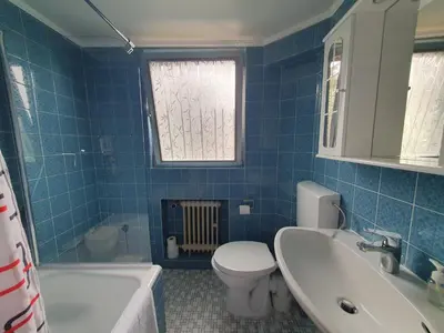 Ein Badezimmer in der Unterkunft Gemütliches Privatzimmer mit französischem Doppelbett an der Universitätsklinik Mainz