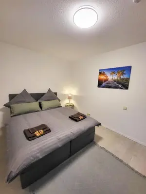 Ein Bett oder Betten in einem Zimmer der Unterkunft Golden Star