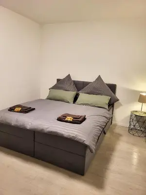 Ein Bett oder Betten in einem Zimmer der Unterkunft Golden Star