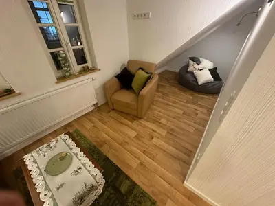 Ein Sitzbereich in der Unterkunft Odenwaldperlchen