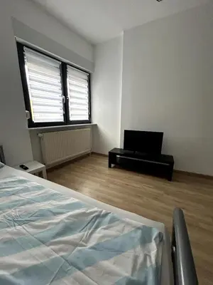 Ein Bett oder Betten in einem Zimmer der Unterkunft Ruhige Unterkunft mit Netflix Küche & Waschmaschine